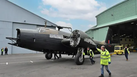 RAF Museum Wellington being moved out of hangar