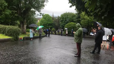 Guard of honour formed to welcome John Hume