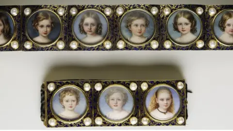 Royal Collection Trust/Her Majesty Queen Elizabeth William Essex, Bracelet with miniatures of the royal children c 1845-50.