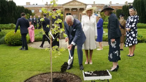 PA Media , The King and Queen will plant a magnolia tree in the Garden of Hillsborough Castle, to mark Their Majesties' Coronation, as Queen Elizabeth II did in 1953.