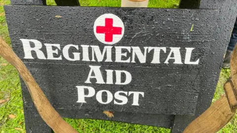 Emma Baugh/BBC A regimental aid post sign which was part of the re-enactment event