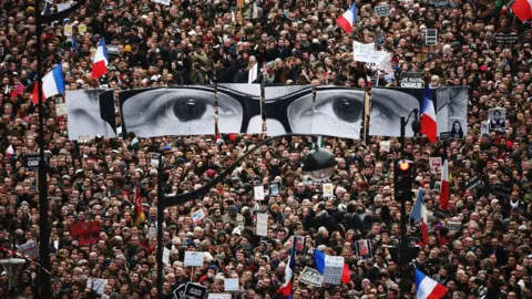 Getty Images Demonstrators make their way along Boulevard Voltaire in a unity rally in Paris following the terrorist attacks in January 2015
