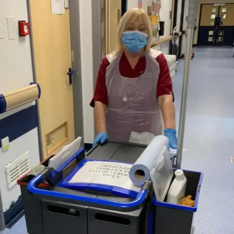 Nerys Conway Staff member in the corridor