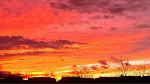 Soberty / Weather Watchers Orange and pink sky over Sherborne