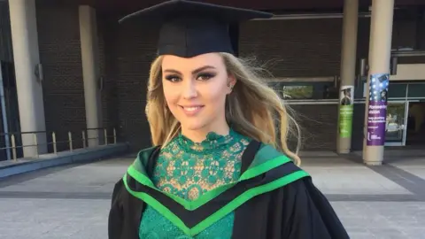 Bridie Kemp in her graduation hat and gown