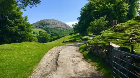 Alan Jones A gate opening up to Dinas hill in Llanfairfechan
