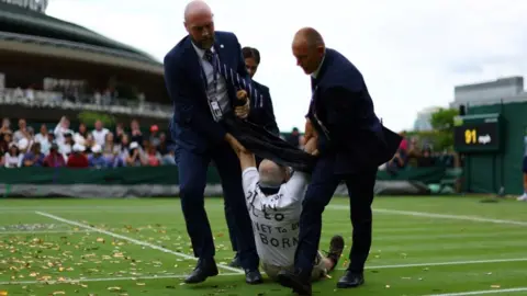 Reuters Protester at Wimbledon