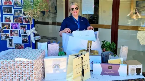 Johanna Black Johanna with her leaving presents when she retired