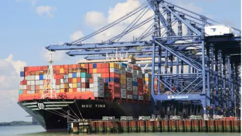 Getty Images Ship holding container shifts