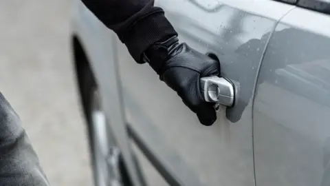 Getty Images Car jacking stock image