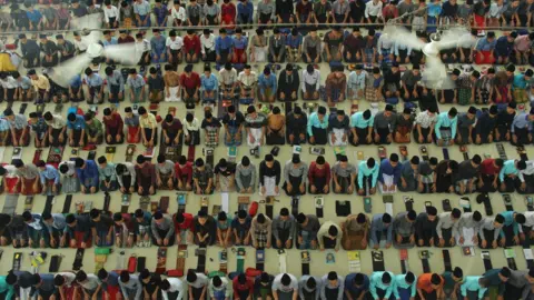 Getty Images Muslims pray in Indonesia