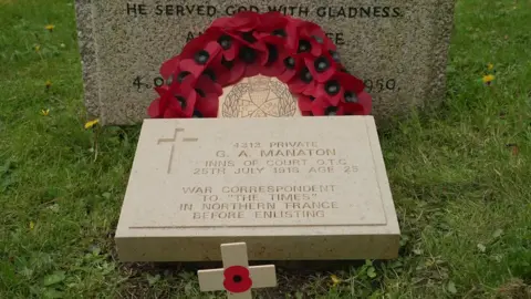 Close up of George Aubrey Manaton's headstone