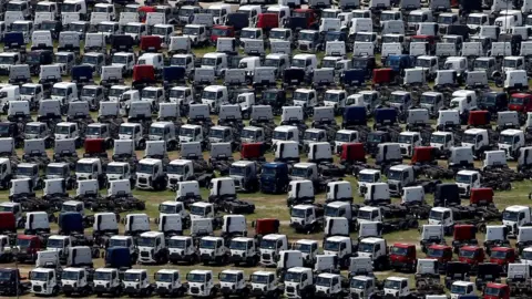 Reuters New Ford trucks are seen at a parking lot of the Ford factory in Sao Bernardo do Campo, Brazil, February 12, 2015.