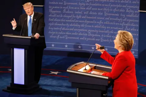 Getty Images Donald Trump and Hillary Clinton debating on 26 September 2016 - the first presidential debate of the 2016 election