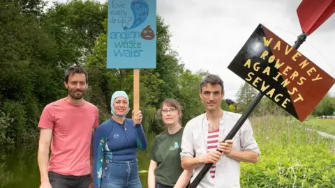 Simon Buck Photography Protestors holding placards in Bungay, Suffolk