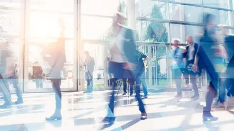 Getty Images People in a city