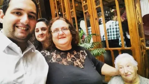 Douglas Sterzza Dias Douglas Sterzza Dias (left), with members of his family