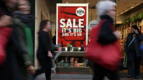 Getty Images Sale sign on high street