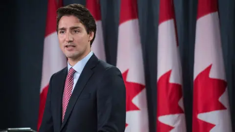 AFP/Getty Images Canadian PM Justin Trudeau issues an apology to LGBT people who were discriminated against by the Canadian government