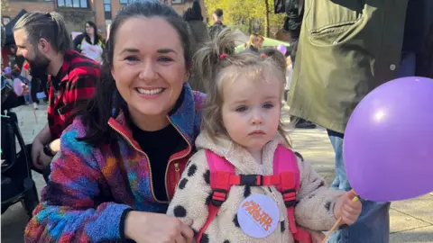 BBC Parent Clare Sloane and daughter at childcare march in Belfast
