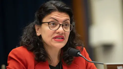 SAUL LOEB/AFP/Getty Images US Representative Rashida Tlaib, Democrat of Michigan, questions US Secretary of Treasury Steven Mnuchin as he testifies during a House Committee on Financial Services hearing on Capitol Hill in Washington, DC, May 22, 2019.