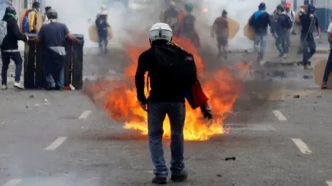 Reuters Protesters battle security forces in 2017