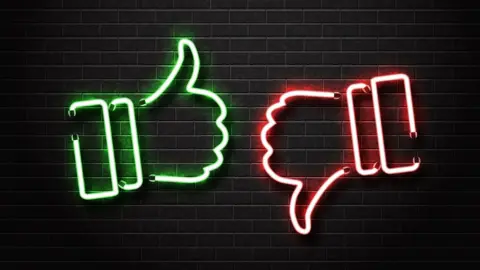 Getty Images Thumbs up and thumbs down Facebook graphic