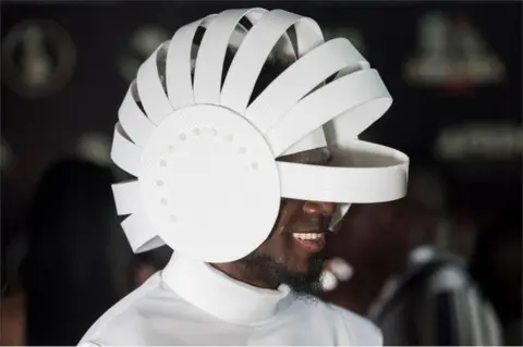 AFP Chadian musician Afrotronix, nominee for the Best Male Artist in Central Africa, arrives to attend the All Africa Music Awards at the Accra International Conference Centre in Accra, Ghana - 24 November 2018