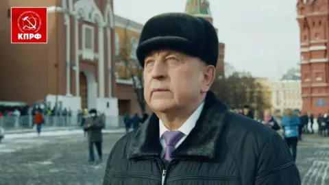 Russian Communist Party Nikolai Kharitonov is portrayed in a campaign video walking to his imagined new job in the Kremlin