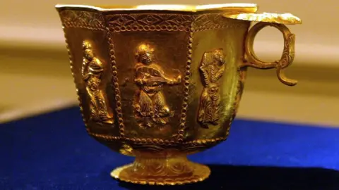 AFP A Tang Dynasty gold cup