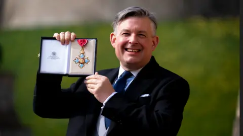 PA Media The Right Honourable Jonathan Ashworth, from Leicester, lately Member of Parliament for Leicester South, is made a Commander of the Order of the British Empire at Windsor Castle