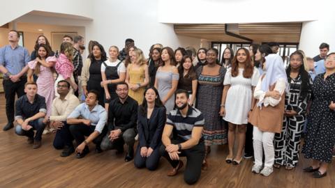 Medical students pose for a photo