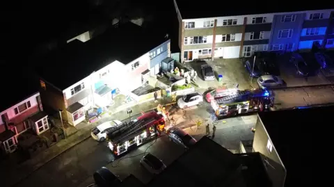 An aerial view of fire crews at a property in Cliff Close, Seaford