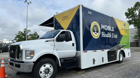 South Carolina Department of Public Health A mobile vaccination truck where people can get measles shots