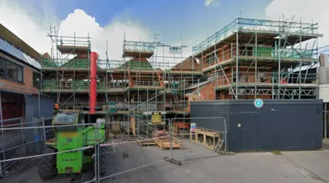 Google The Life Factory building mid-build surrounded by scaffolding