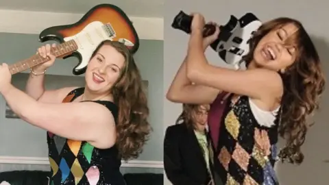 Kelly Russell On the left is Kelly holding an electric guitar above her head, wearing a black sparkly vest top with coloured diamonds on it. She has long wavy brown hair, On the right Miley is dressed exactly the same doing the same pose. 
