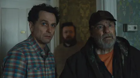 Apple TV Matthew Rhys and Stephen Root in widow's Bay