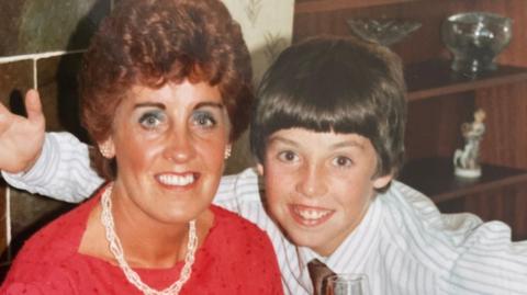 Mrs Wilson with her son Gavin as a child