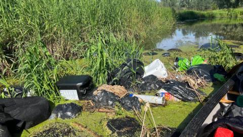 Rubbish that had been dumped in the River Waveney