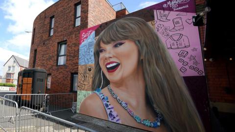 A mural of Taylor Swift on Phoenix Hotel in Liverpool