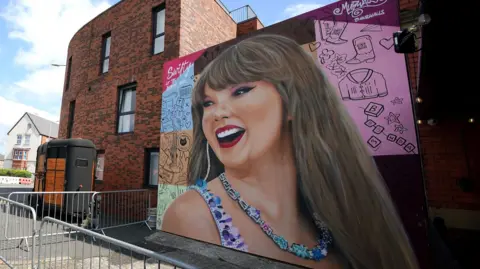 PA A mural of Taylor Swift on Phoenix Hotel in Liverpool