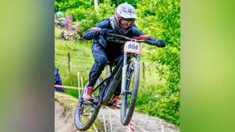 Turnip Towers Photography James Anderson airborne on his mountain bike