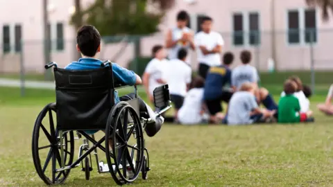 Warren Photography/Getty Stock image of a disabled child