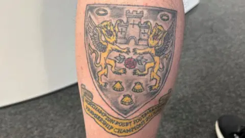 Rob Constantin/BBC Simon Stacey's Northampton Saints tattoo