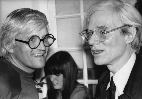 Getty Images British and American artists David Hockney (l) and Andy Warhol
