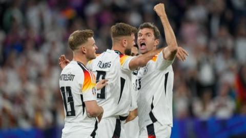 Germany celebrate against Scotland