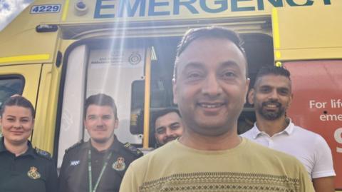 Paramedics and Mr Shah