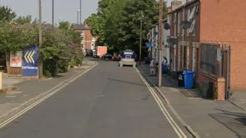Street view with houses lining a road