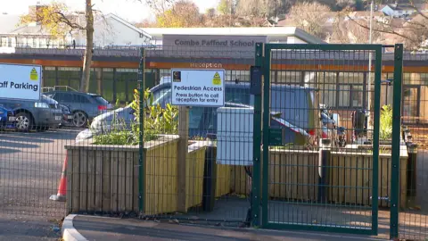 BBC The front of Combe Pafford School in Torquay on a sunny day