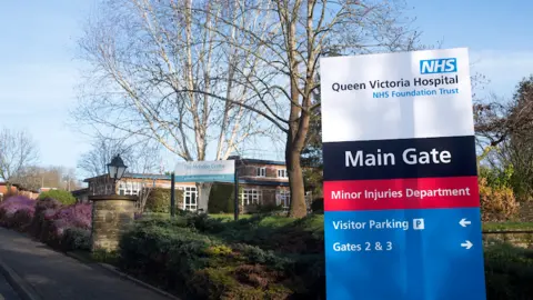 The entrance to NHS Queen Victoria Hospital.